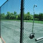 HarTru Court with black chain link fencing